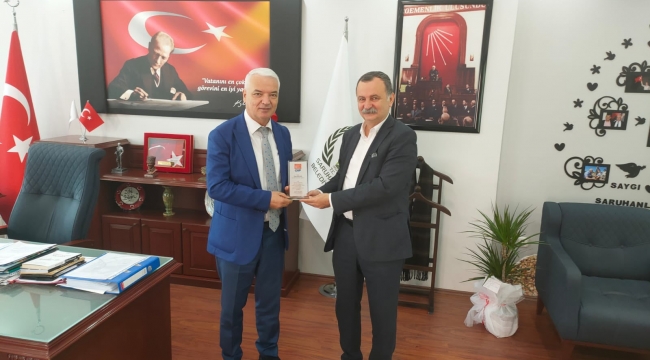 İl başkanından belediye başkanına başarı plaketi