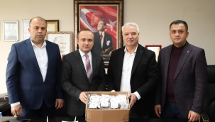 Başkan Bilgin öğrencilere 10 bin paket kuru üzüm dağıttı