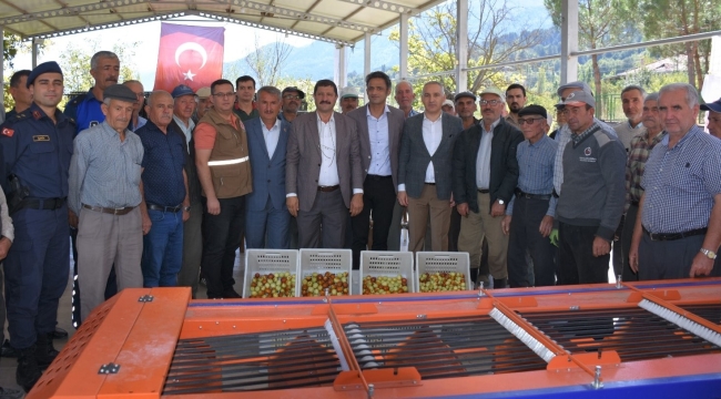 Demirci'de boylama makinesi teslimini ve kasa dağıtımını 