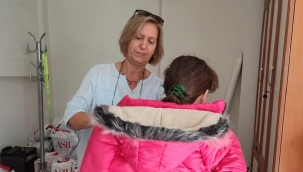 CHP'li kadınlar yoksul çocukları giydirdi