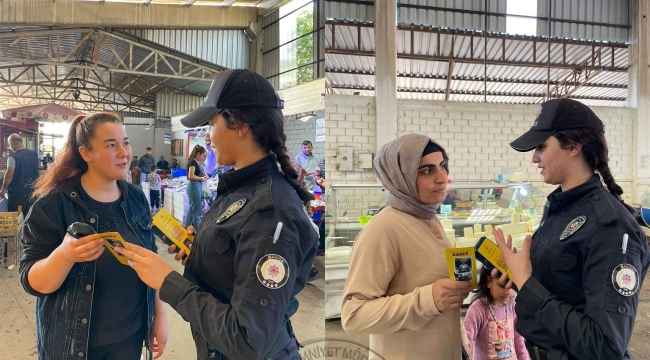 Polis pazarda aile içi şiddetle mücadele broşürü dağıttı
