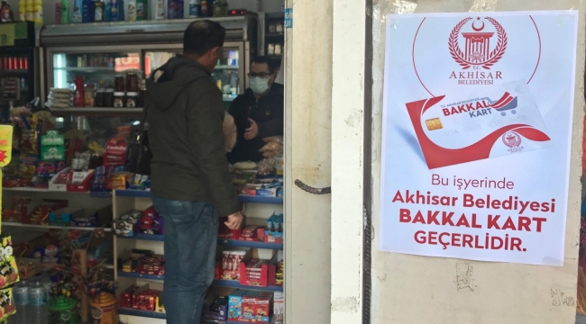 Akhisar belediyesinde 874 haneye bakkal kart desteği