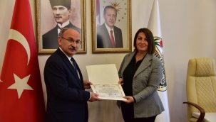 OSB Bölge Müdürü Karaboran'a, eğitime katkı plaketi