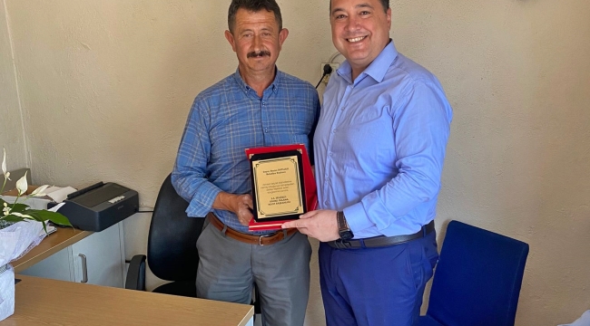 Başkan Dutlulu'ya plaket