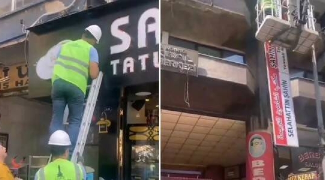 İzmir'de arapça tabelalar indirirldi,vatandaş alkışladı