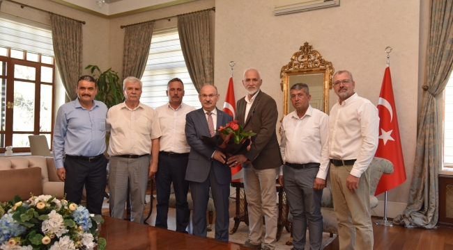 Saruhanlı mahalle mutarları vali Karadeniz'i ziyaret etti