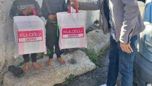 CHP'den yoksullara"minik ayaklar üşümesin"yardımı