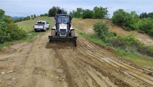 Gördes'te belediye yağışlardan bozulan arazi yıllarını bakıma aldı