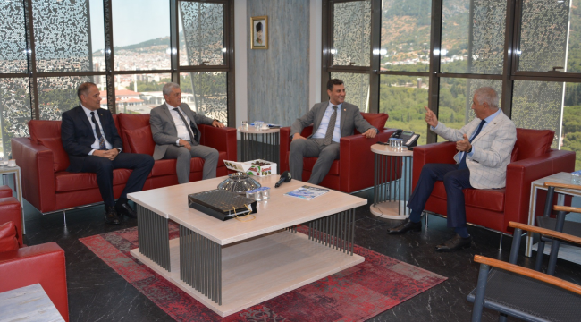 TSO başkanı Yüksel başkan Zeyrek'ı para kongresine davet etti