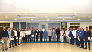 Görevlerinde üstün başarı gösterenler belgelerini aldı