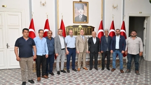 Turgutlu'lu muhtarlar vali Özkan'ı ziyaret etti