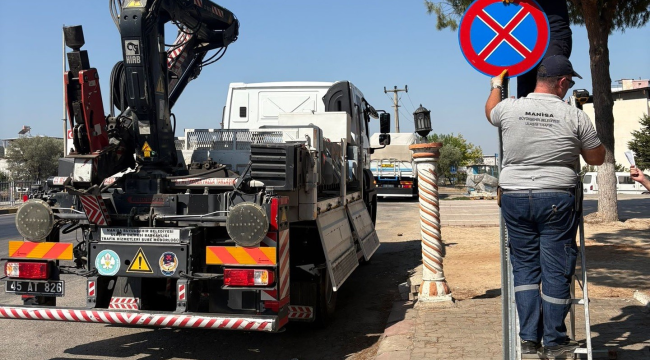 Ahmetli'de trafik akışını tehlikeye sokan araçlara park yasağı geldi