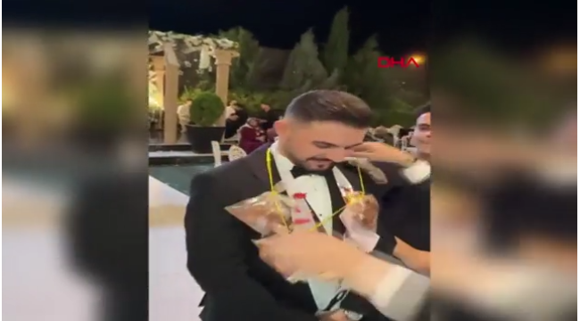 Düğünde ilginç anlar: Damada altın yerine pirzola takıldı!