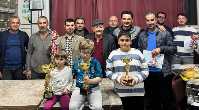 Üyelerini ödüllendirdi